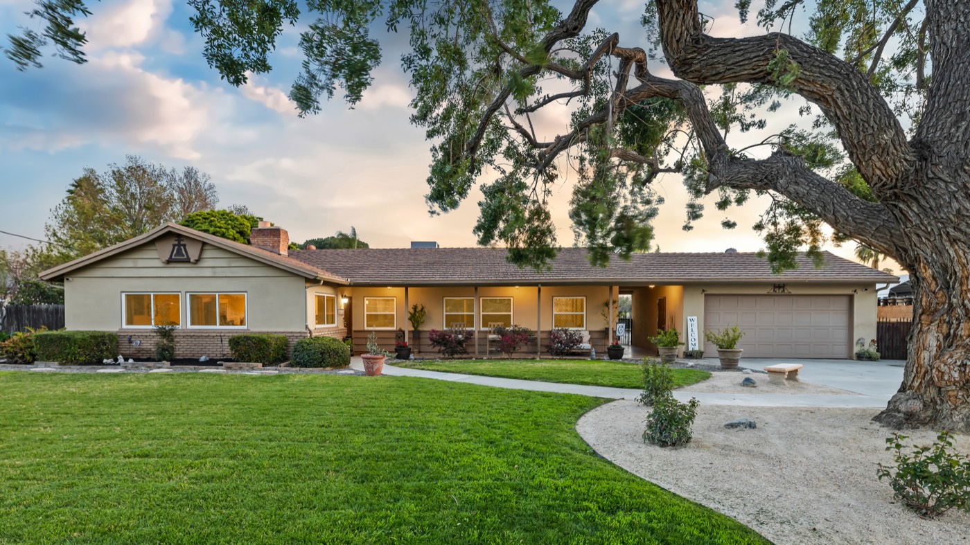 A twilight exterior photograph of a listing produced by Stillwater Productions