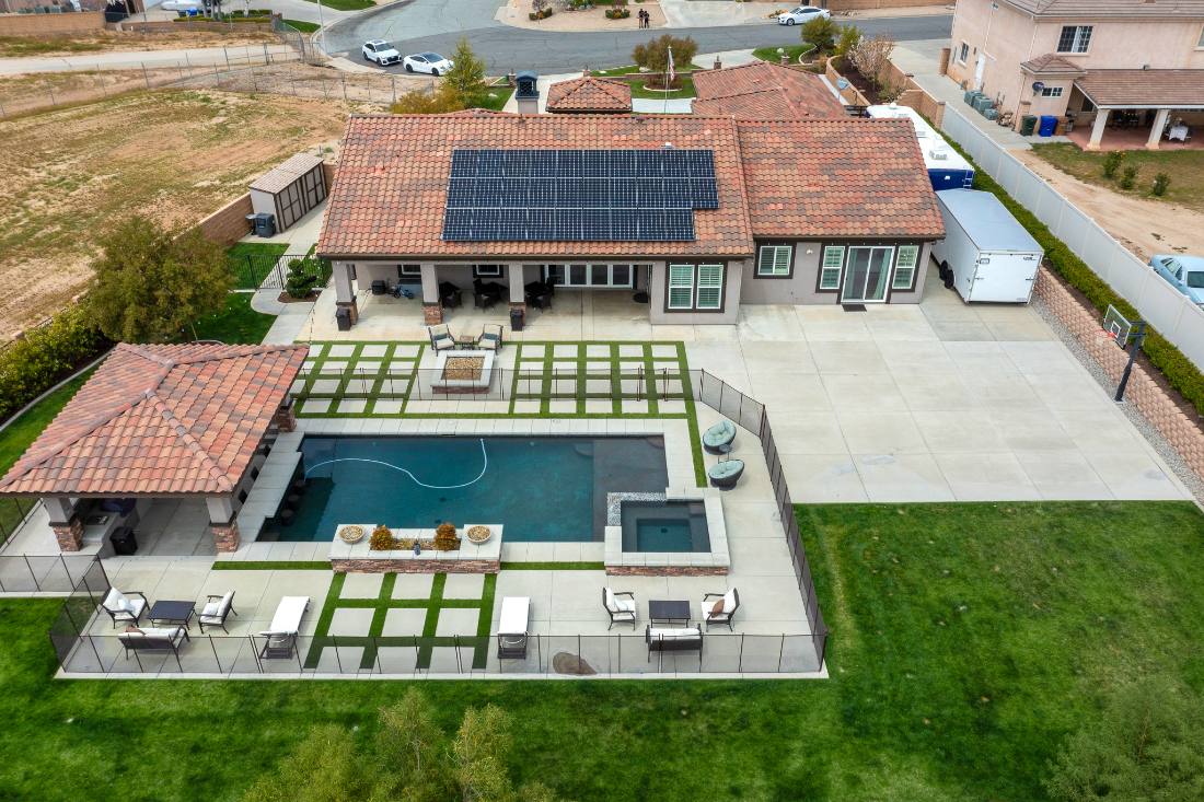 Aerial, backyard pool, pavilion, and lawn